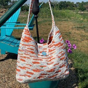 Crochet plarn crossbody bag.  Handmade from recycled retail plastic bags.